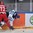 MOSCOW, RUSSIA - MAY 21: Russia's Maxim Chudinov #73 hits Finland's Aleksander Barkov #61 into the boards during semifinal round action at the 2016 IIHF Ice World Hockey Championship. (Photo by Minas Panagiotakis/HHOF-IIHF Images)

